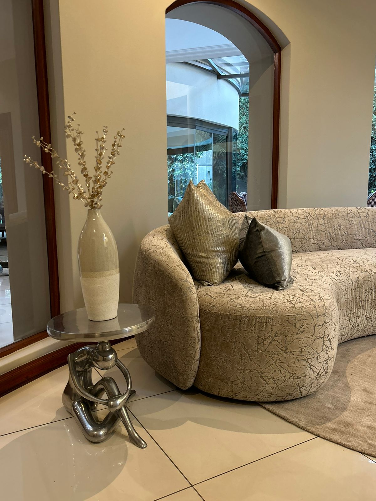 Curved Lounge Suite & Sculptural Side Table