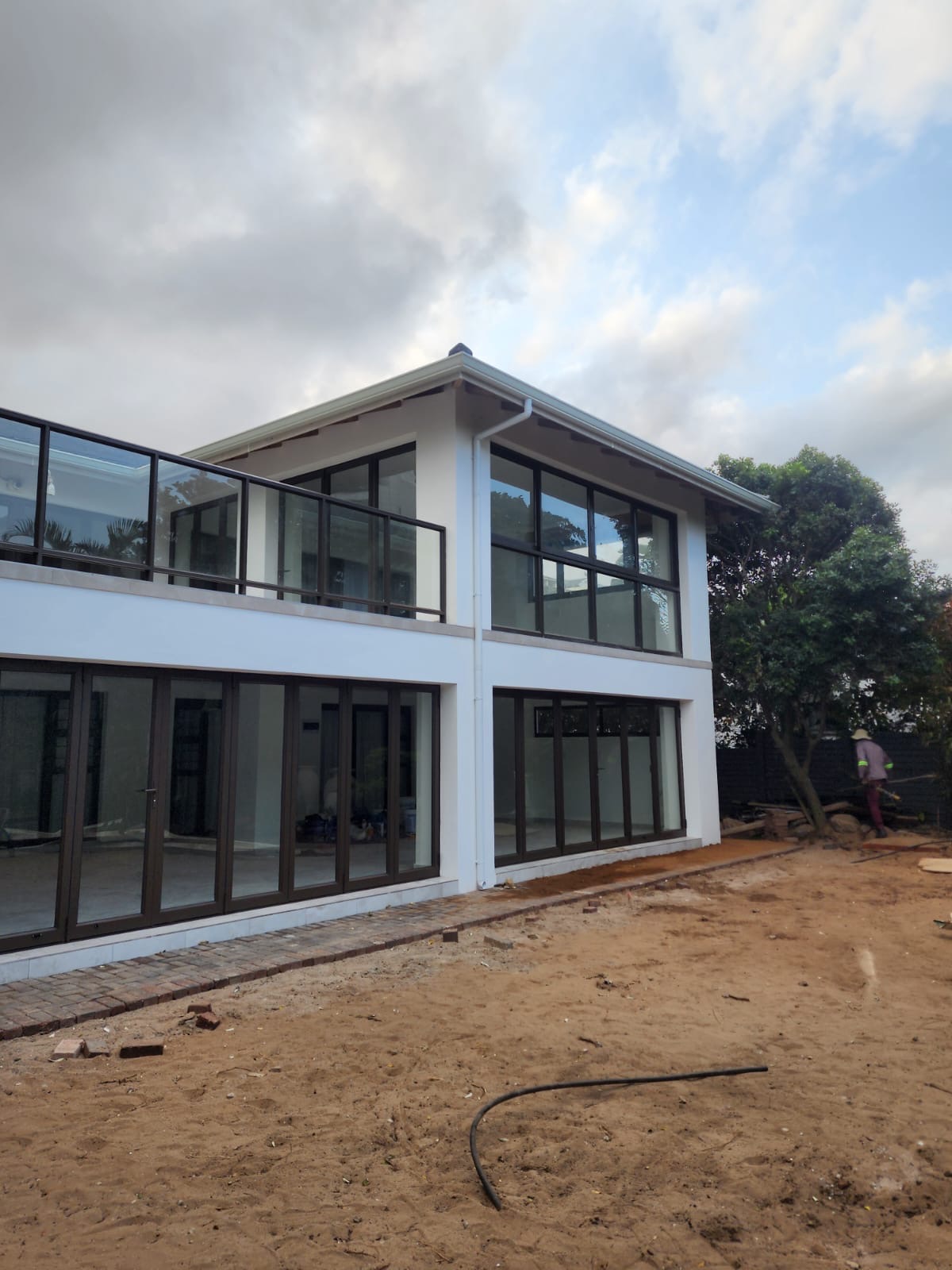 Double-Storey New Build with Glass Balcony