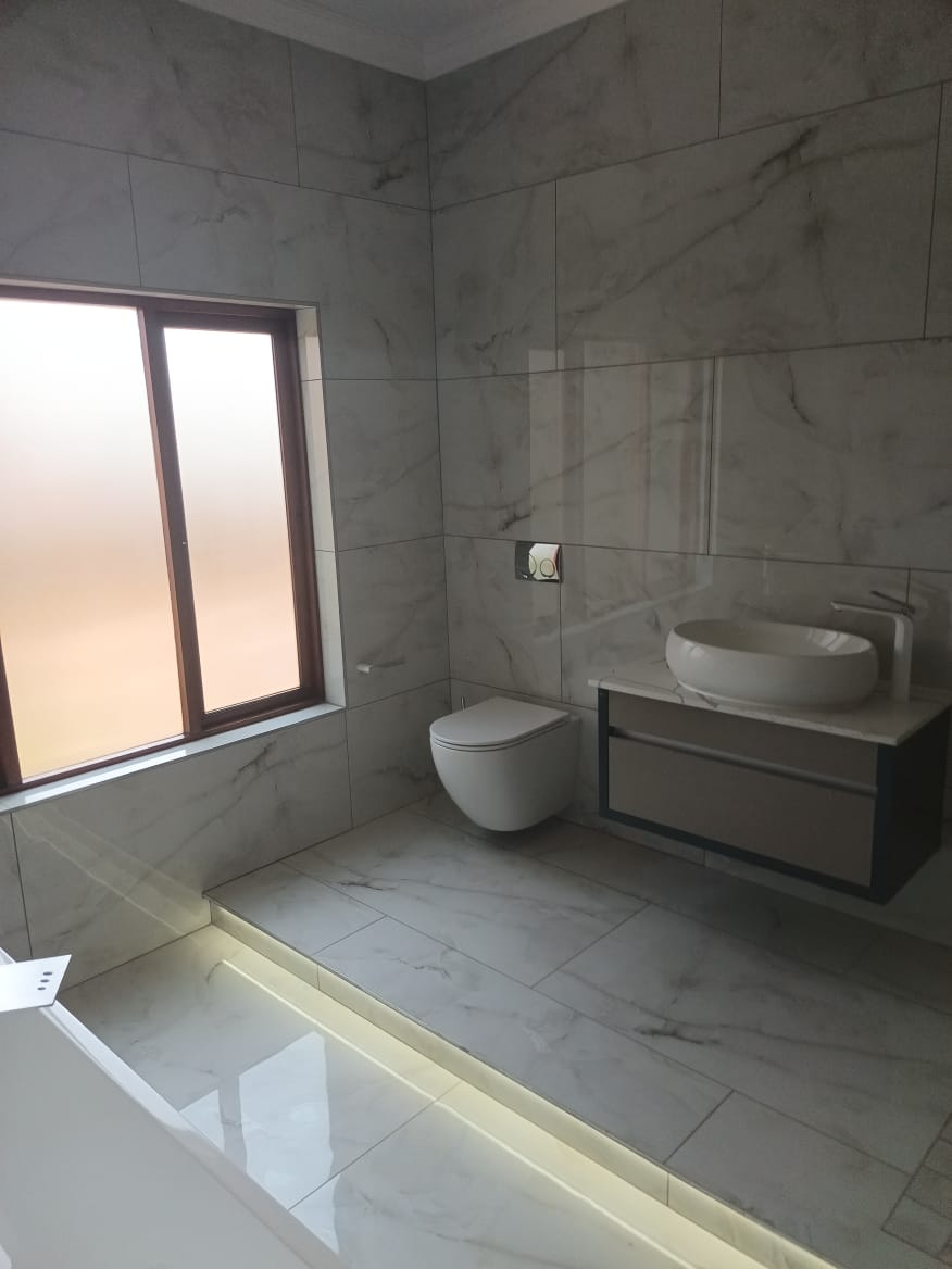 Marble Master Bathroom with LED Accent Lighting