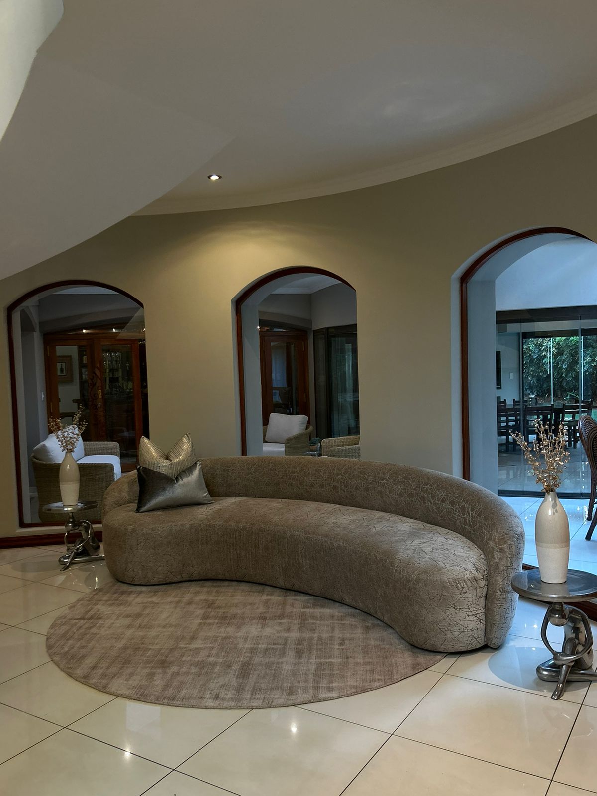Curved Foyer Lounge with Triple Arches