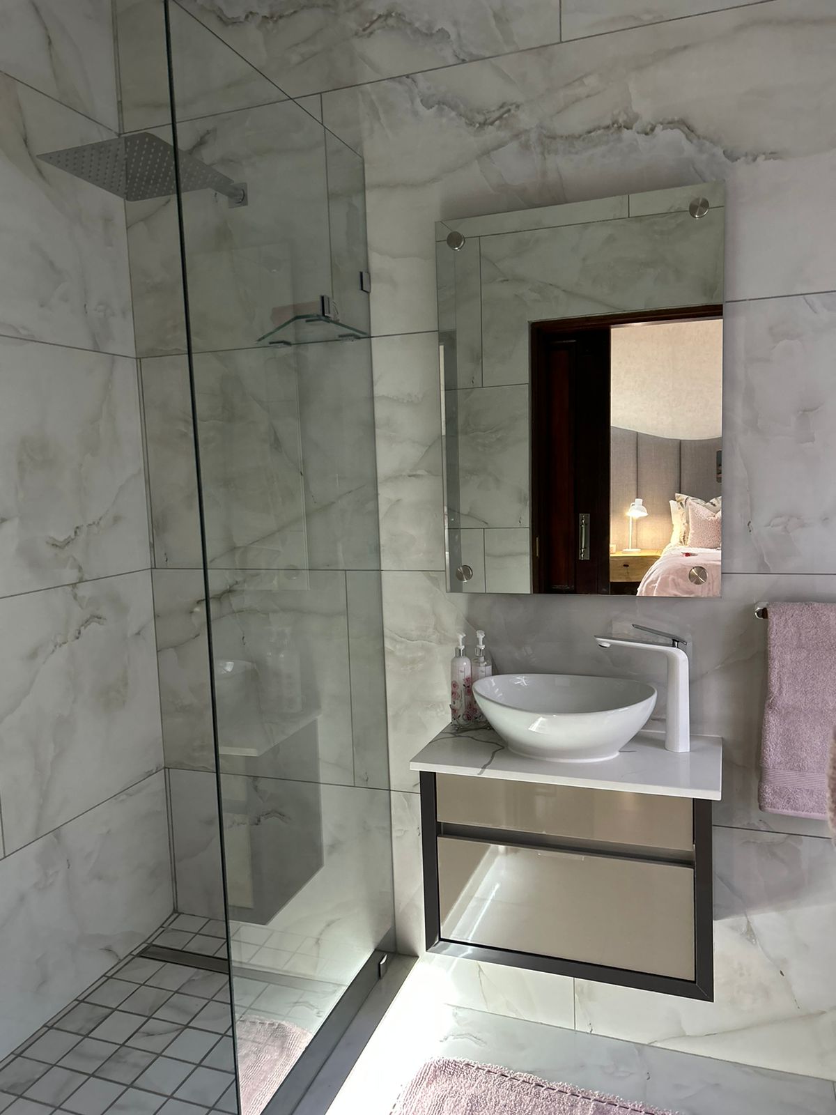 Marble Walk-In Shower & Floating Vanity