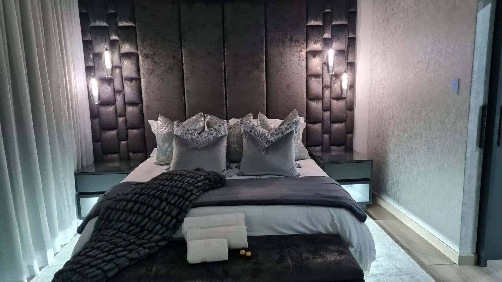 Statement Bedroom with Pendant Lighting