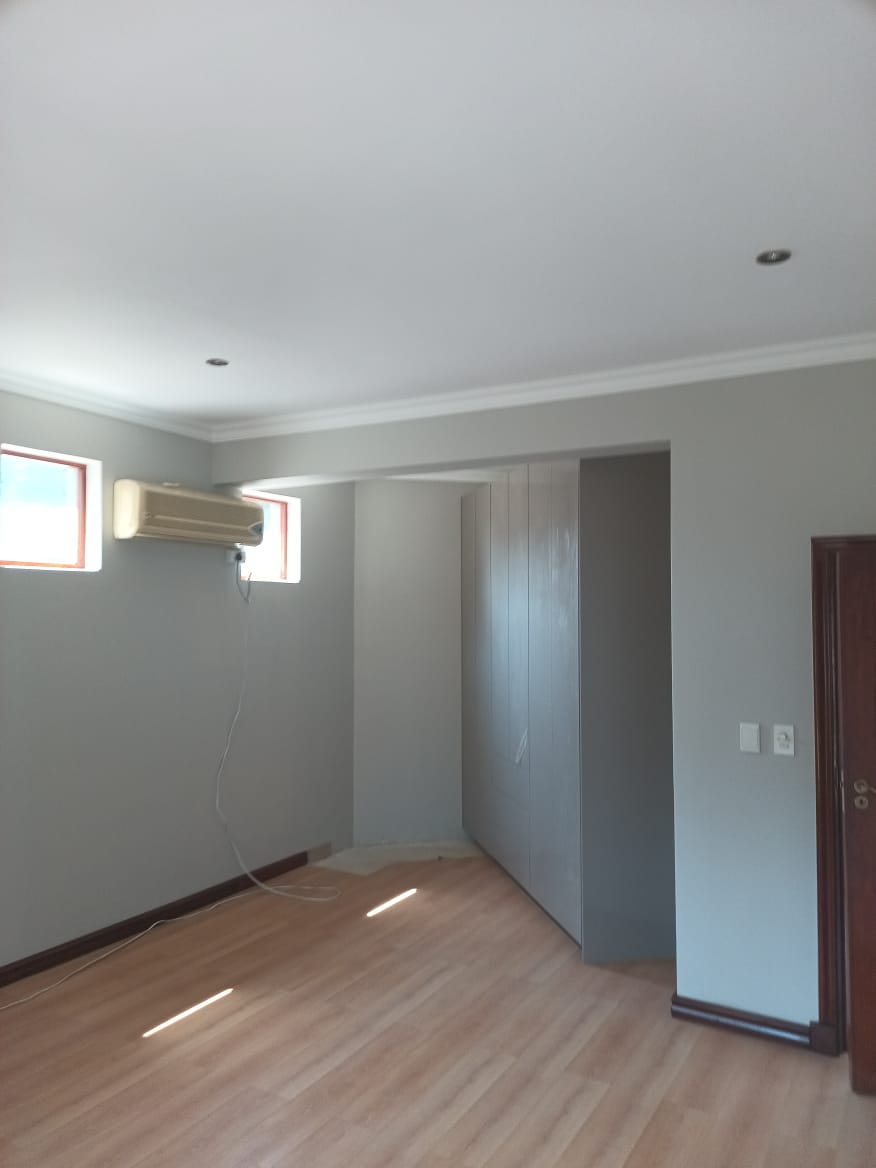Refurbished Bedroom with Built-In Cupboards